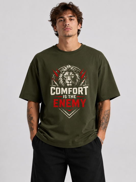 Person wearing a green t-shirt with a lion graphic and text on a gray background