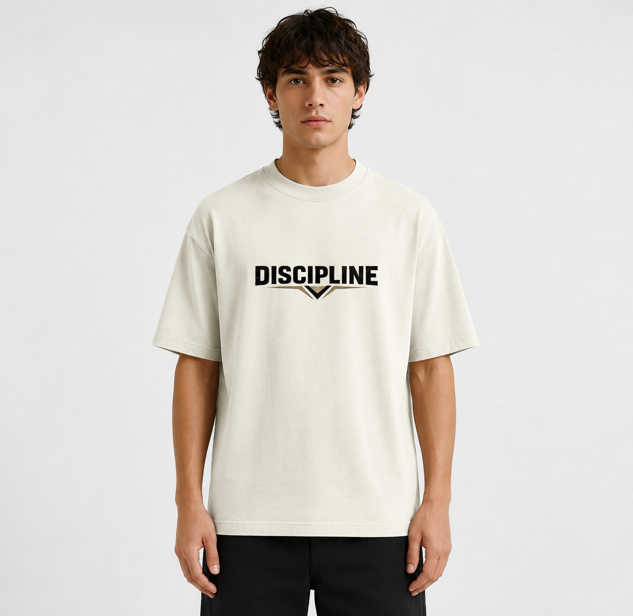 Person wearing a white t-shirt with 'DISCIPLINE' text on a plain background